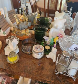 e88- collectibles and decorations on shelf and drawers - Image 3