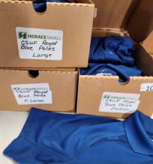 g1011- corner store royal blue cases of shirts - Image 2