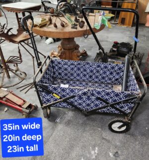 d119- Fold up wagon. Needs to be cleaned
