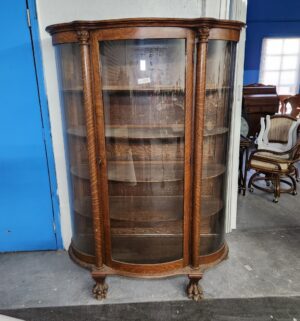 d123- Original Keystone Tiger Oak Curved Glass Curio. Claw Foot