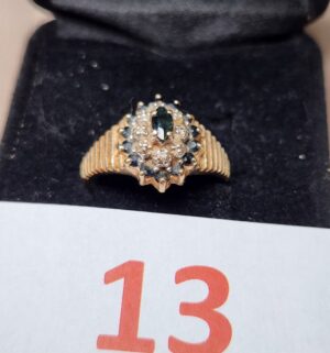 e13- 10kt Gold Ring with Genuine Diamont Accents. Tested 10k gold