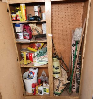 h245- Garden Products in Cabinet