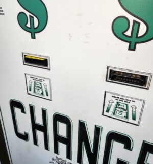 j58- Standard Change Makers Machine. Powers On. No Keys. Locksmith to drill out locks. Buyer to Carefully Remove. - Image 2
