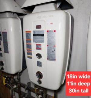 j100- Paloma Gas Water Heater Model PH-24AM-DN. Buyer to Carefully Remove & Disconnect. - Image 1