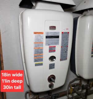 j101- Paloma Gas Water Heater Model PH-24AM-DN. Buyer to Carefully Remove & Disconnect. - Image 1