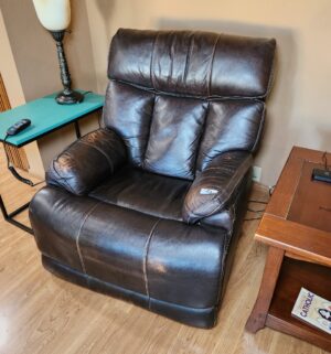 m92- Flexsteel Electric Recliner w/ Lumbar Support. Fading can be re-stained. - Image 1