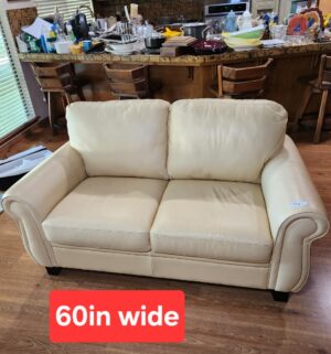 m96- Meadowridge Leather Loveseat. Lemon Color. Very faint signs of wear seen - Image 1