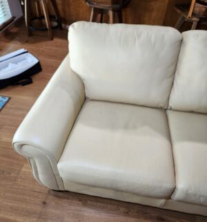 m96- Meadowridge Leather Loveseat. Lemon Color. Very faint signs of wear seen - Image 2