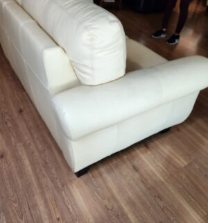 m96- Meadowridge Leather Loveseat. Lemon Color. Very faint signs of wear seen - Image 5
