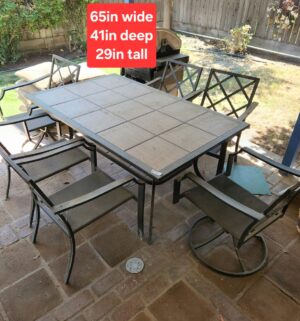 o10- Tile Top 8 Chair Patio Set. Great Condition. Needs a basic cleaning