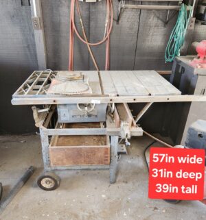 o51- Likely Craftsman 10 inch Table saw w/ blades. Tested/works