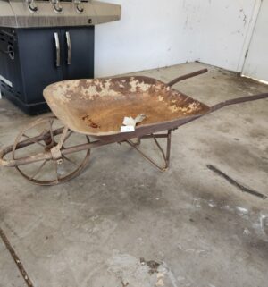 w77- Antique 1800s iron wheelbarrow. Very good shape