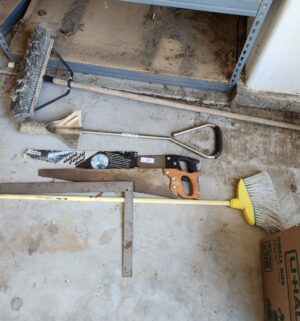 w83- saws, yard tools, brooms