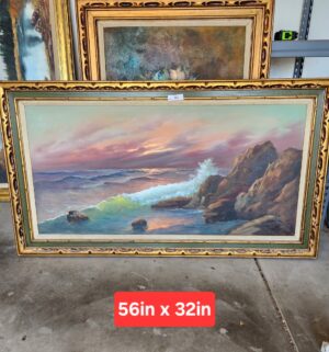 w86- Seascape with crashing waves and a sunset. Signed oil. Sm tear