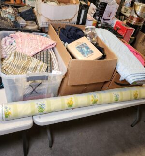 y262- 3 boxes of sewing patterns & material - Image 1