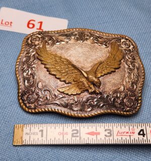 z61- Crumrine western-style belt buckle featuring a gold-plated soaring eagle