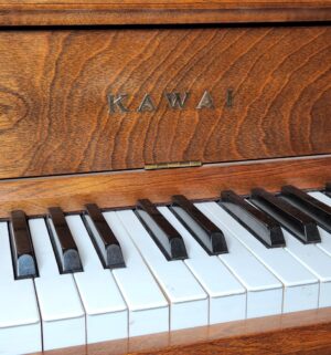 a81- Kawai 802-F upright piano in a medium pecan finish. w/ music - Image 4
