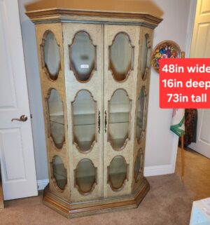 a156- distressed finish octagonal lighted curio cabinet with glass doors