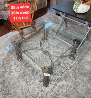 b96- Glass Top Coffee table. Chipped edges