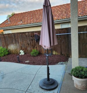 b125- large patio umbrella w/ stand. Great shape