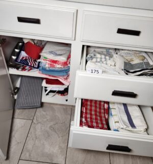 b175- utensils, kitchen rags and items in cabinets
