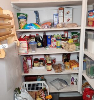 b205- Contents of the kitchen pantry. Buyer to remove all contents