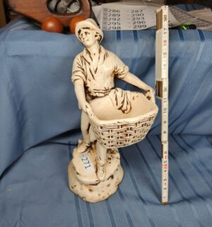 c271- Marwal chalkware statue of a boy holding a basket - Image 1