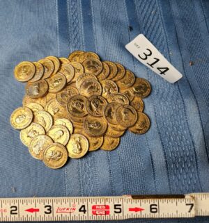 c314- pile o gold paperweight - Image 1