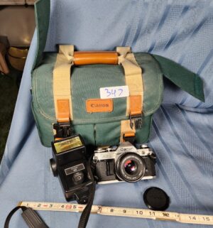 c347- Canon AE-1 camera. Vivitar flash, bag - Image 1