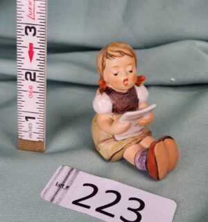 d223- M.I. Hummel Girl with Sheet Music