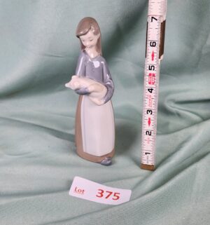 d375- Girl with Pig w/ Box. Lladro