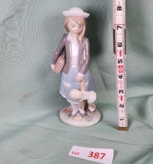 d387- School Girl with Doll w/ Box. Lladro