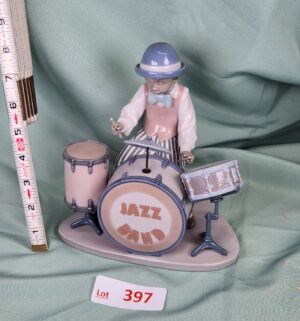 d397- Jazz Drums. Broken Drum Stick w/ Box. Lladro