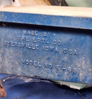 e6- Ertl Ford F-68 pedal tractor, which is a collectible ride-on toy. - Image 7