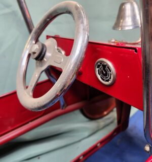 e22- vintage-style red fire engine metal pedal car - Image 10