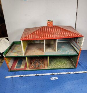 e127- Cohn tin lithograph dollhouse, likely a two-story colonial style - Image 1