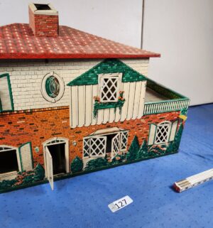 e127- Cohn tin lithograph dollhouse, likely a two-story colonial style - Image 9