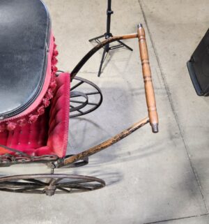 e129- Victorian-era baby carriage, possibly German, featuring a metal frame and red velvet upholstery. - Image 9