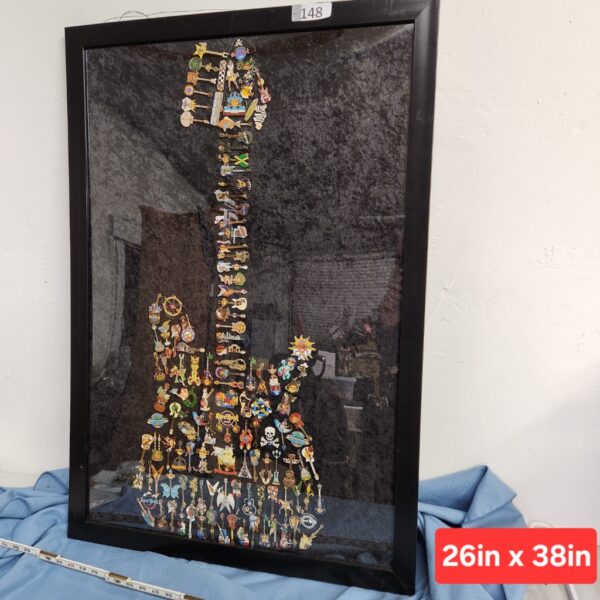 e148- large collection of Hard Rock Cafe pins arranged in the