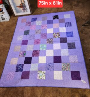 g285- handmade purple patchwork quilt.