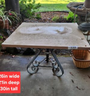 g339- table with decorative iron base