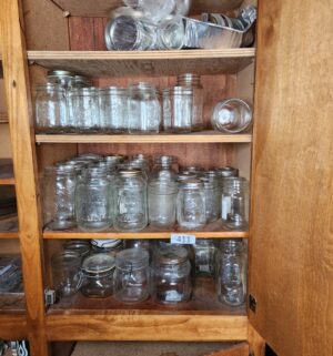 g411- cabinet of mason jars