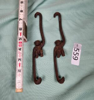 g559- vintage cast iron monkey hooks