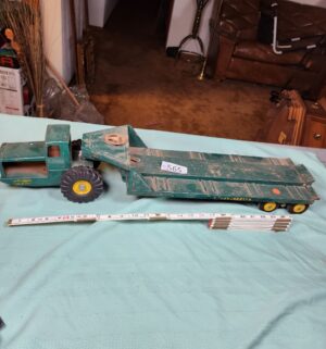 g565- 1950s Nylint Tournahauler pressed steel toy truck