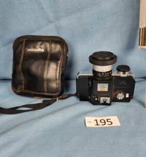 h195- Minolta 110 Zoom SLR