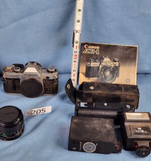 h205- Canon AE-1 Camera w/ accessories
