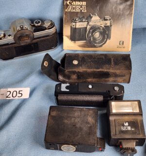 h205- Canon AE-1 Camera w/ accessories - Image 4