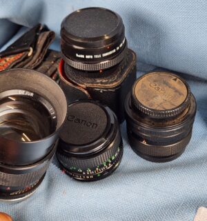 h205- Canon AE-1 Camera w/ accessories - Image 5