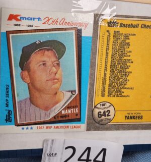 h244- Mickey Mantle Card & book w/ other collectibles - Image 1