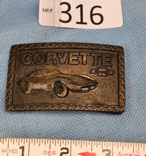 h316- 1970s brass Chevrolet Corvette belt buckle
